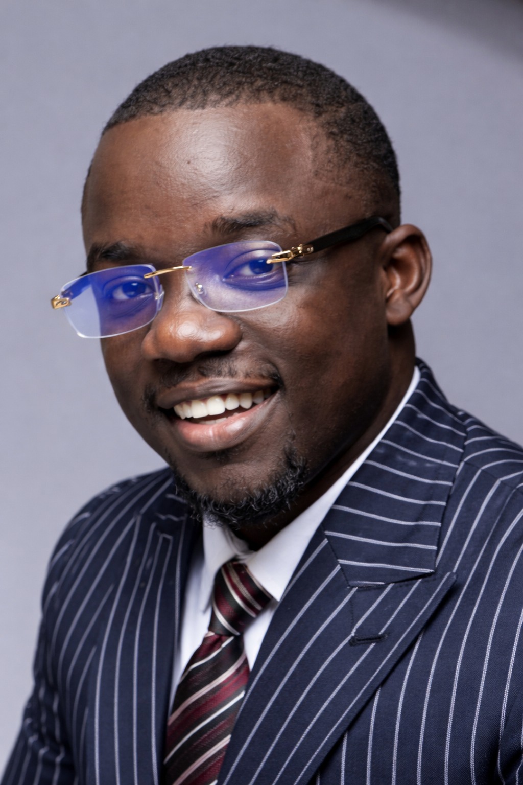 Portrait of Tioluwalogo Olakunbi-Black