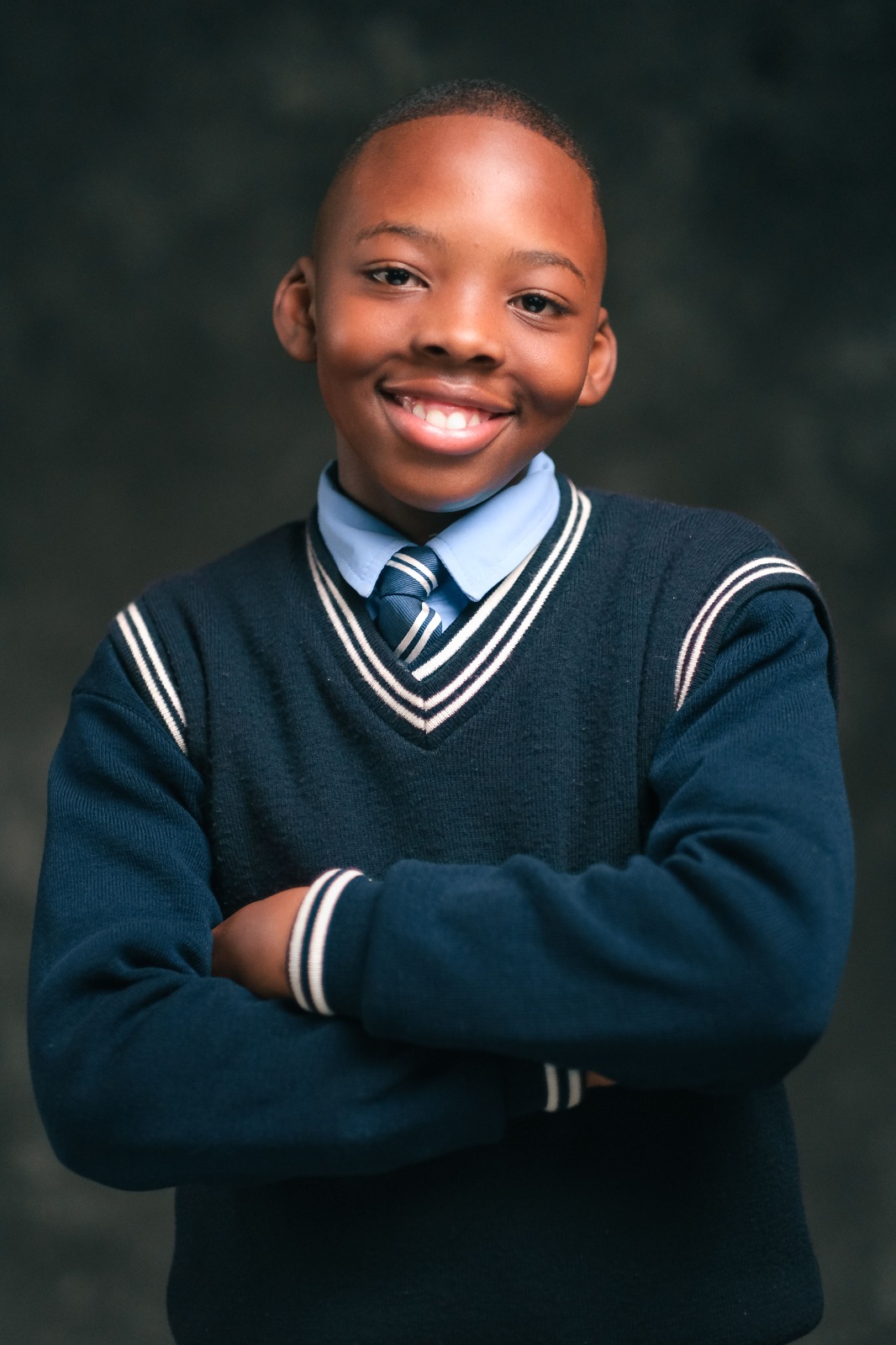 African boys in mentorship and conversation with an older man, golden hour